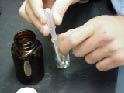 puttin gacid in vial